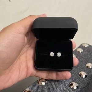 18k white gold plated sterling silver stud earrings.
